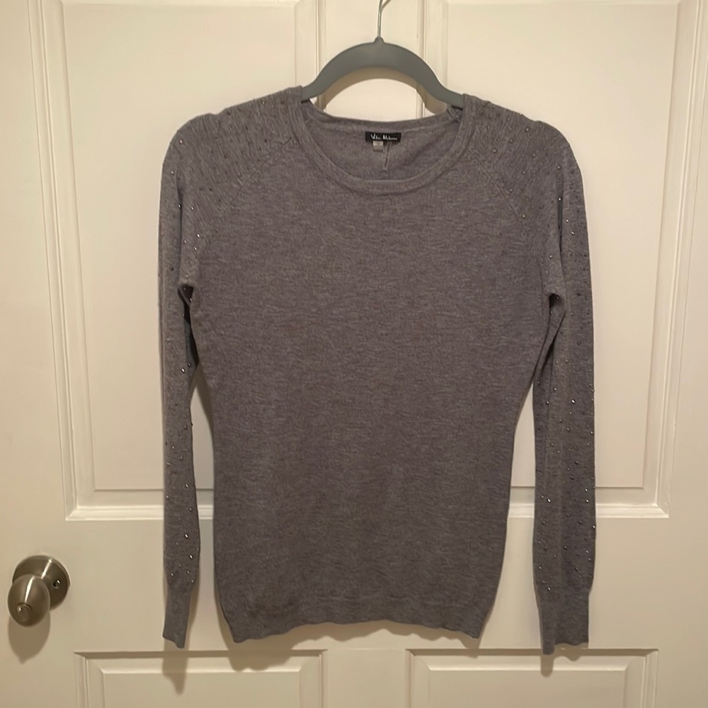 Crew neck sweater with silver beaded sleeves. Size small